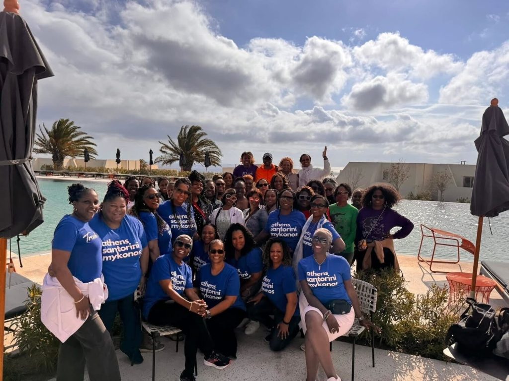 Travels divas group picture in Greece poolside.