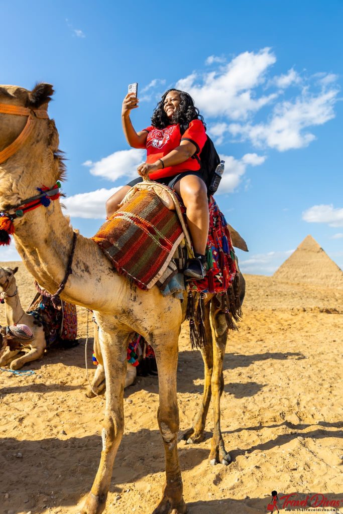 Travel Diva taking a selfie on camel back in Egypt