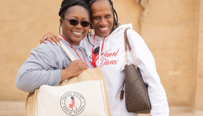 Two travel divas taking a photo in Morocco