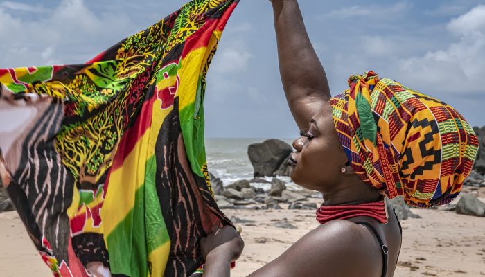 Ghana woman on the beautiful beach of axim located in ghana west africa
